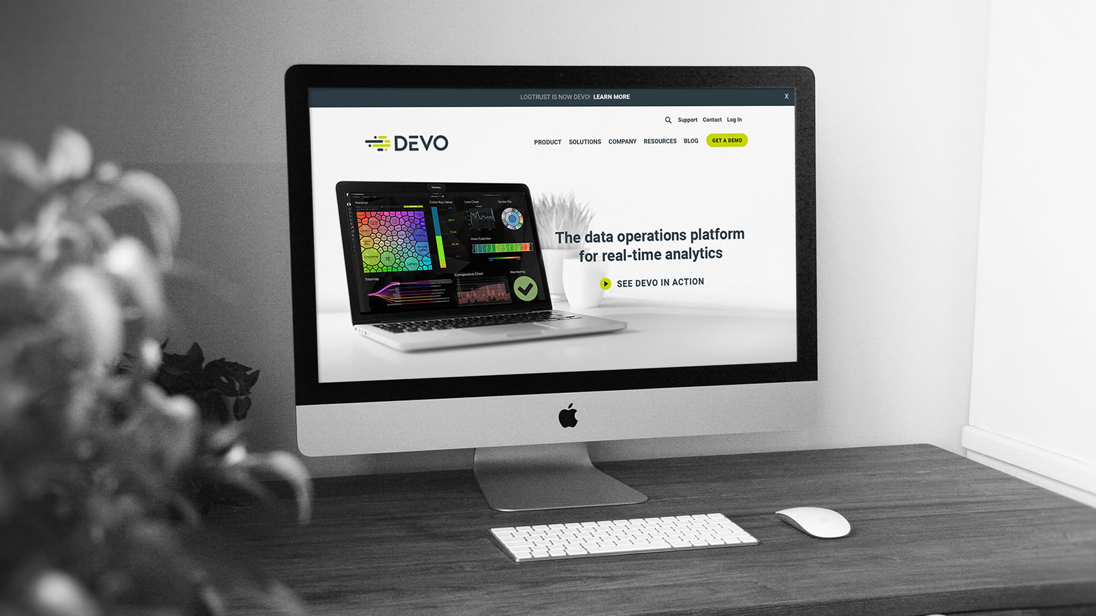 Devo, Inc. Brand Identity – Website Design: Homepage on a Desktop Monitor