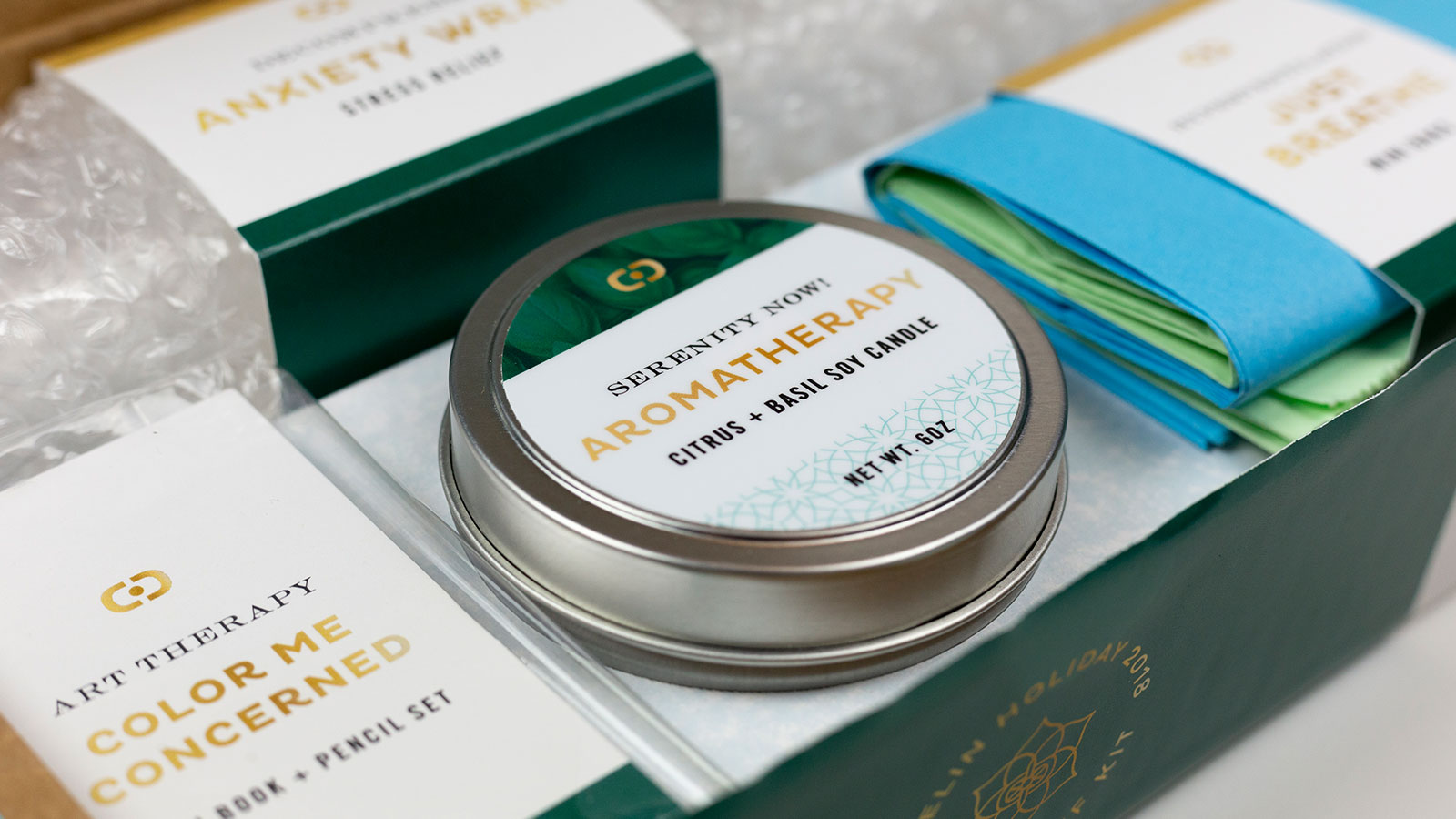 Delin Design Holiday 2018 Stress Kit Direct-Mail Promotion: "Serenity Now!" Citrus Basil Candle Detail